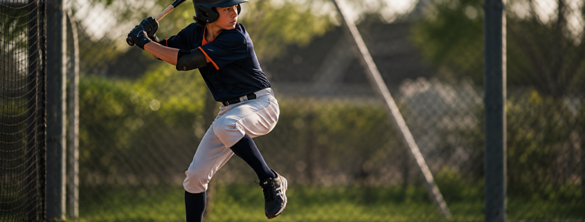 Youth hitter working on load timing with batting timing drills — float drill position at stride lift