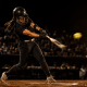 Fastpitch softball hitter in load position showing fastpitch softball hitting mechanics breakdown