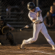 Youth baseball hitter at contact showing back foot position and hip rotation in a back foot baseball swing