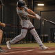 Youth baseball player fixing bat drag with the RNT resistance band drill — racing rear elbow before and after
