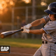 Hitter demonstrating locked out lead arm position at contact on a batting tee