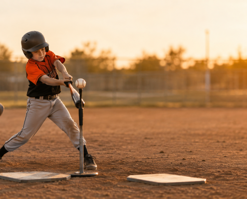 Youth baseball hitter at the plate working through a hitting slump using the two-plate adjustment drill